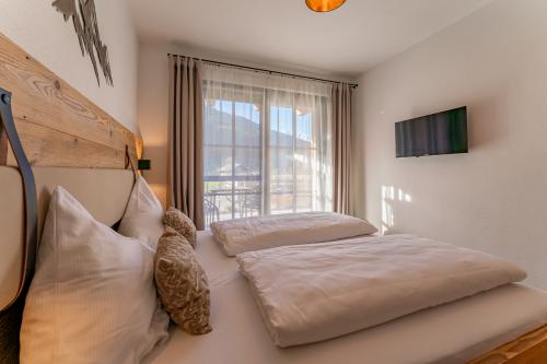 Schlafzimmer EG-ferienhaus_Niedernsill_zell_am_see_Österriech_Chalet_Charlotte_exklusiv_luxus-12